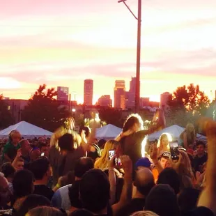a crowd of people at a music festival