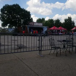 tables and chairs in a parking lot