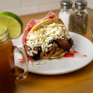 Pabellón Arepa (Venezuelan arepa with shredded beef, sweet plantain, black beens and cheese