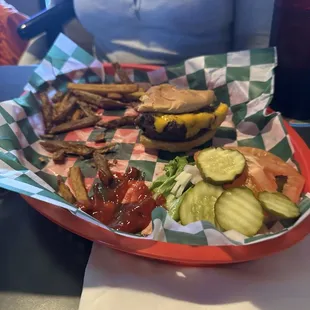What&apos;s left of a Cheeseburger*/fries
