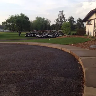 a golf cart parked in a driveway