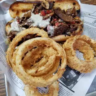 Philly Cheese Steak with homemade onion rings.