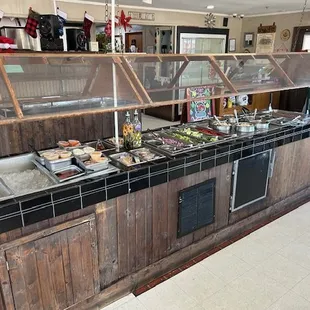 a buffet with a variety of food items