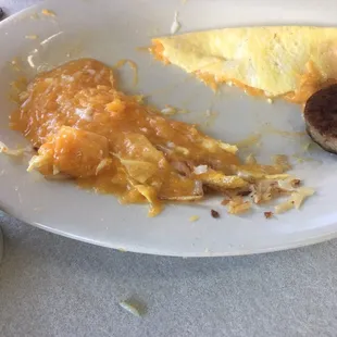 Excuse me sir, would you like more eggs with your cheese? Yes folks that's cheese. There was more cheese than egg in that omelet.