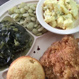 Fried chicken breast, turnip greens, butter beans,, potato salad, corn bread
