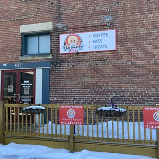 Rear entrance off of city parking lot