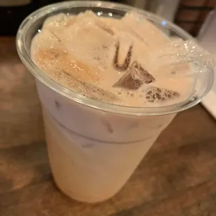 Iced chai latte, available in regular or sugar free. Choose your milk: regular whole milk, oat milk, or almond milk.