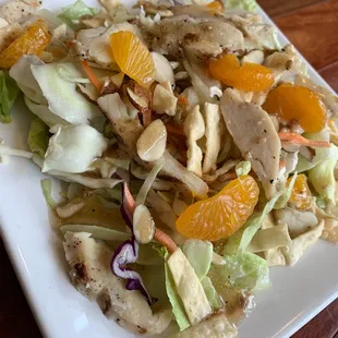 Asian chicken salad (lettuce mix, shredded cabbage, wonton strips, sliced almonds, mandarin oranges, grilled chicken &amp; Asian sesame dressing