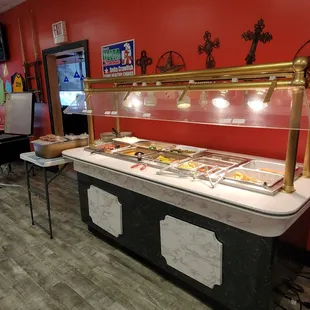 a buffet with a variety of food items