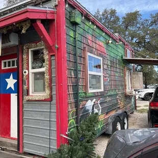 a car parked in front of it
