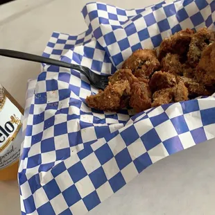 Fried mushrooms after we ate half of the order! Great portions and awesome battering and seasoning!