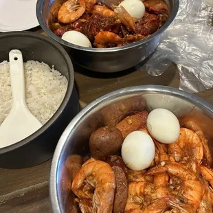 Craw fish &amp; shrimp trifecta spicy and medium w sausages and potatoes. I added my own boiled eggs lol