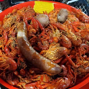 5 lbs of crawdads, sausage, corn and potatoes