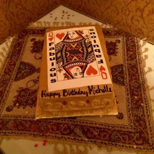 a playing card cake on a table