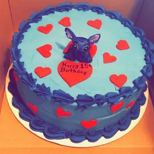 a blue and red birthday cake