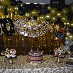 a birthday party with balloons and decorations