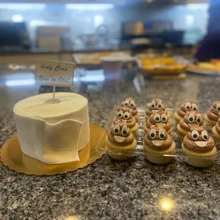 a roll of toilet paper and cupcakes