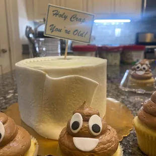 three cupcakes with googly eyes