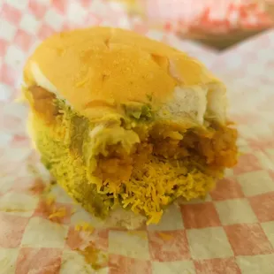 Dabeli 3/5 Its pretty good, and would probably be 5/5 if there was pomergrante in there and the outside was toasted