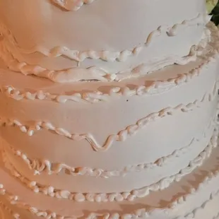 The SIDE of the cake she brought to the wedding.