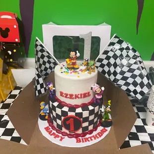 Cake cost over $200 and my sister bought the characters herself and the cake is super plain with cut out squares of black fondant.