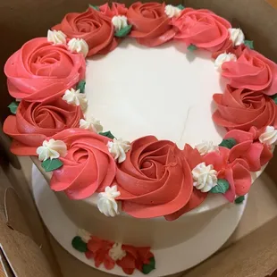 White cake, raspberry filling, and buttercream frosting