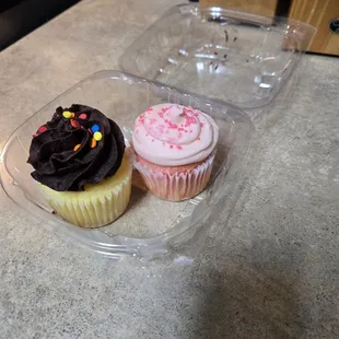 Cupcakes; strawberry and yellow with chocolate icing