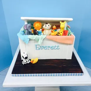 a toy chest with toys on it