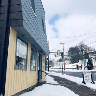a person walking down a snowy street