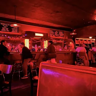 people sitting at a bar