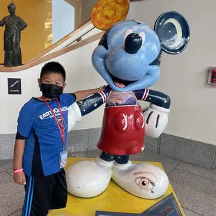 My little human with Mickey on display!