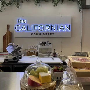 a display of cheese and fruit