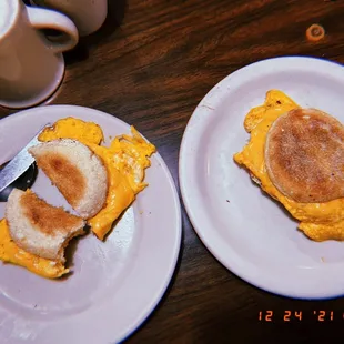two plates of breakfast food
