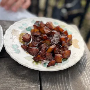 a plate of food on a picnic table