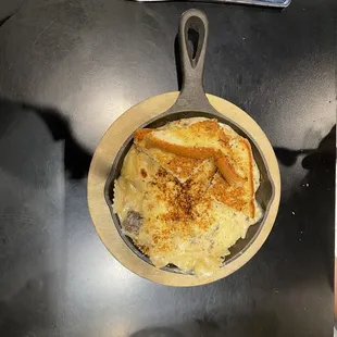 Skillet Mac-n-cheese: gouda and cheddar, beef, and mushrooms.