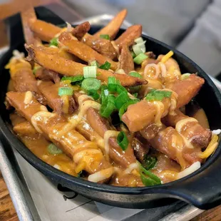 January 11, 2025; Cheesy Curry Chips ($12).