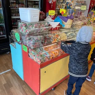 two children looking at candy