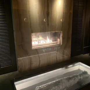 Fireplace in the Cannon Room with see through floor