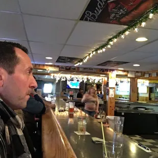 a man sitting at the counter