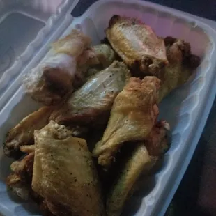 Under cooked wings that my friend ordered. Which makes me sick just by looking at it