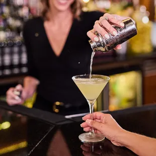 Freshly sliced Dole pineapple and precisely infused vodka make up our signature martini, the Doli.