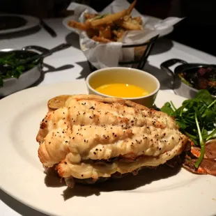 SA Lobster Tail: 10-12oz ($85). Sauteed Spinach with Garlic Confit ($12). Parmesan Truffle Fries ($12). Soy-Glazed Brussels Sprouts ($13).