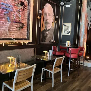 a portrait of a man on the wall