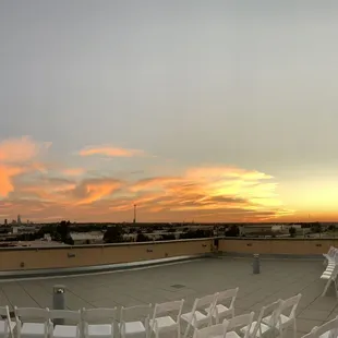 Beautiful Oklahoma Sunset highlighting the OKC skyline before a roof top ceremony
