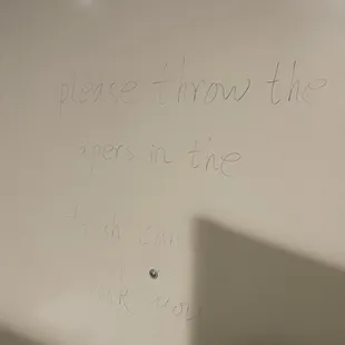 a whiteboard with writing on it