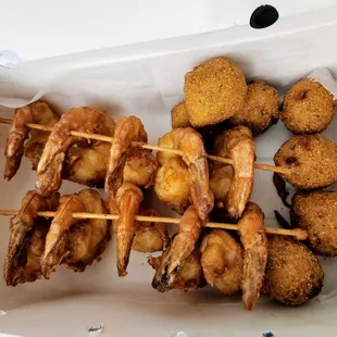 Large jumbo fried shrimp and small hush puppies