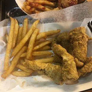Catfish tenders &amp; fries. Super light &amp; seasoned well!