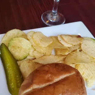 Pulled pork sandwich and chips