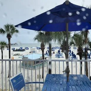 Window seat next to the beach on a rainy day!