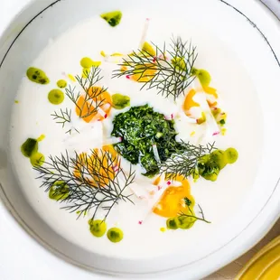Cauliflower Soup with farm radish, chive blossom, buttermilk, herb pistou
